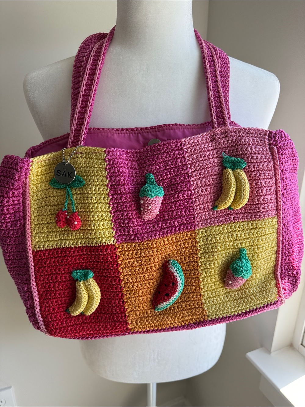 The Sak Pink Crochet Patchwork Tote with Fruit Appliqués